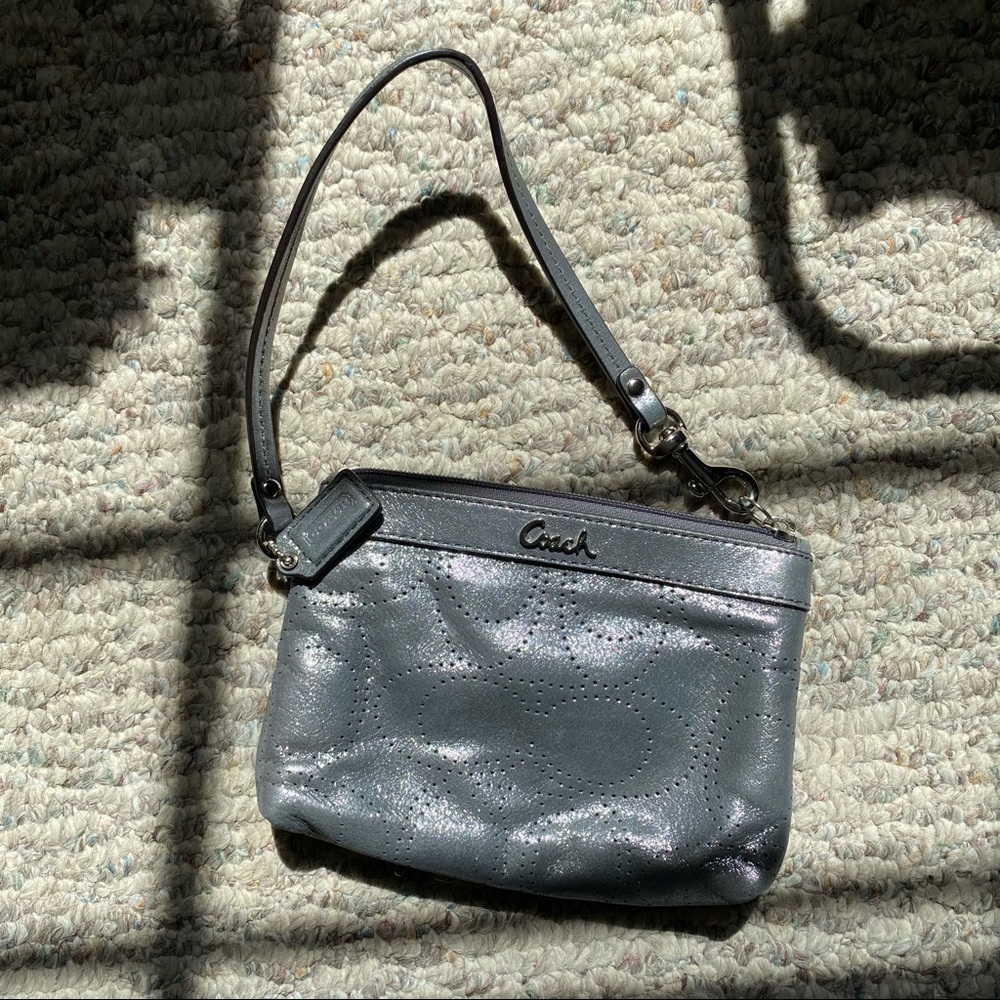 Coach metallic perforated logo wristlet